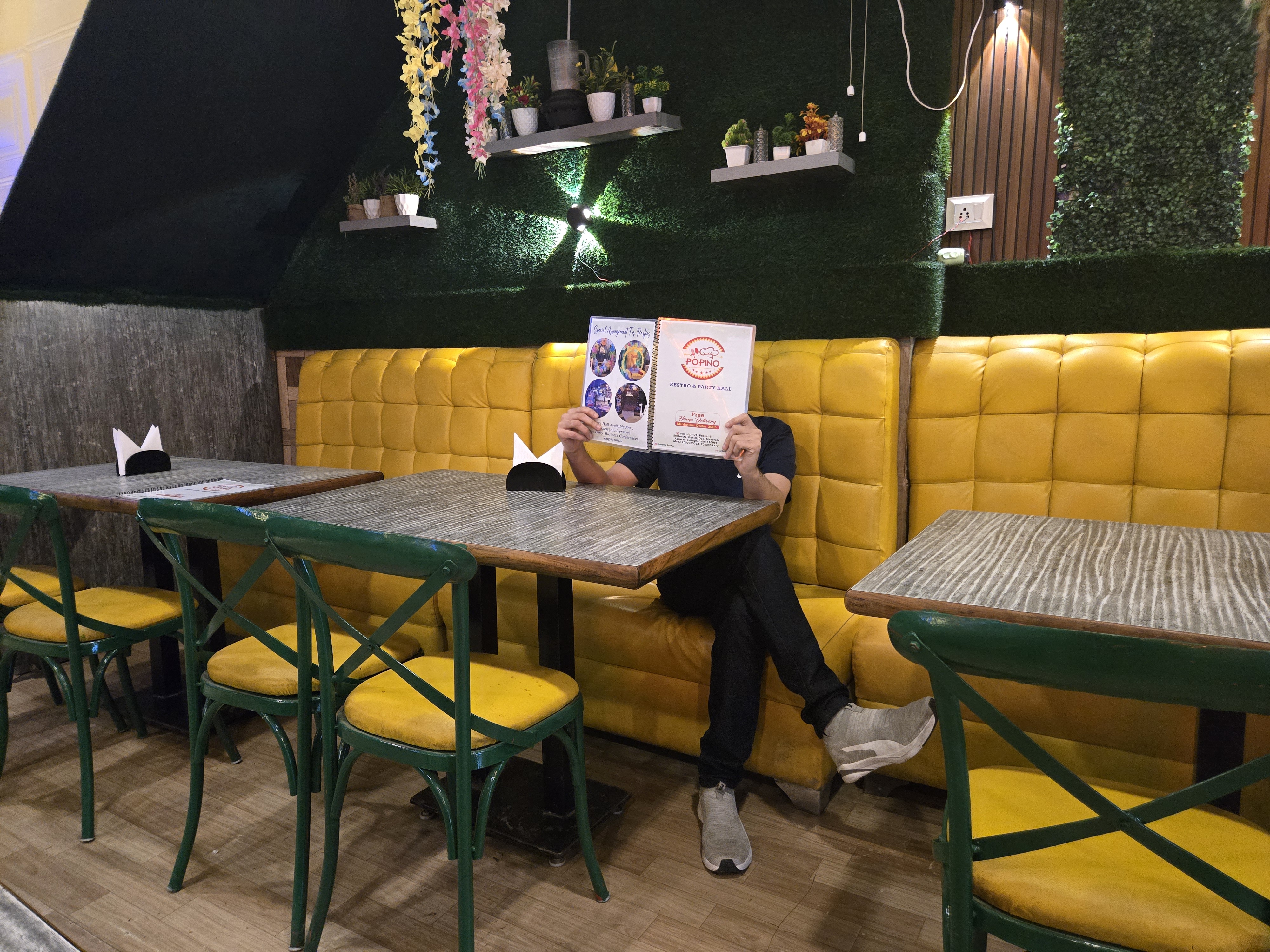 Popino Restro and Party Hall seating area