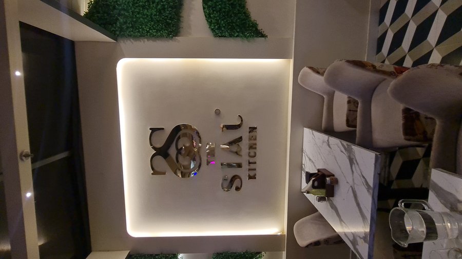 The Sial Kitchen restaurant signage and seating